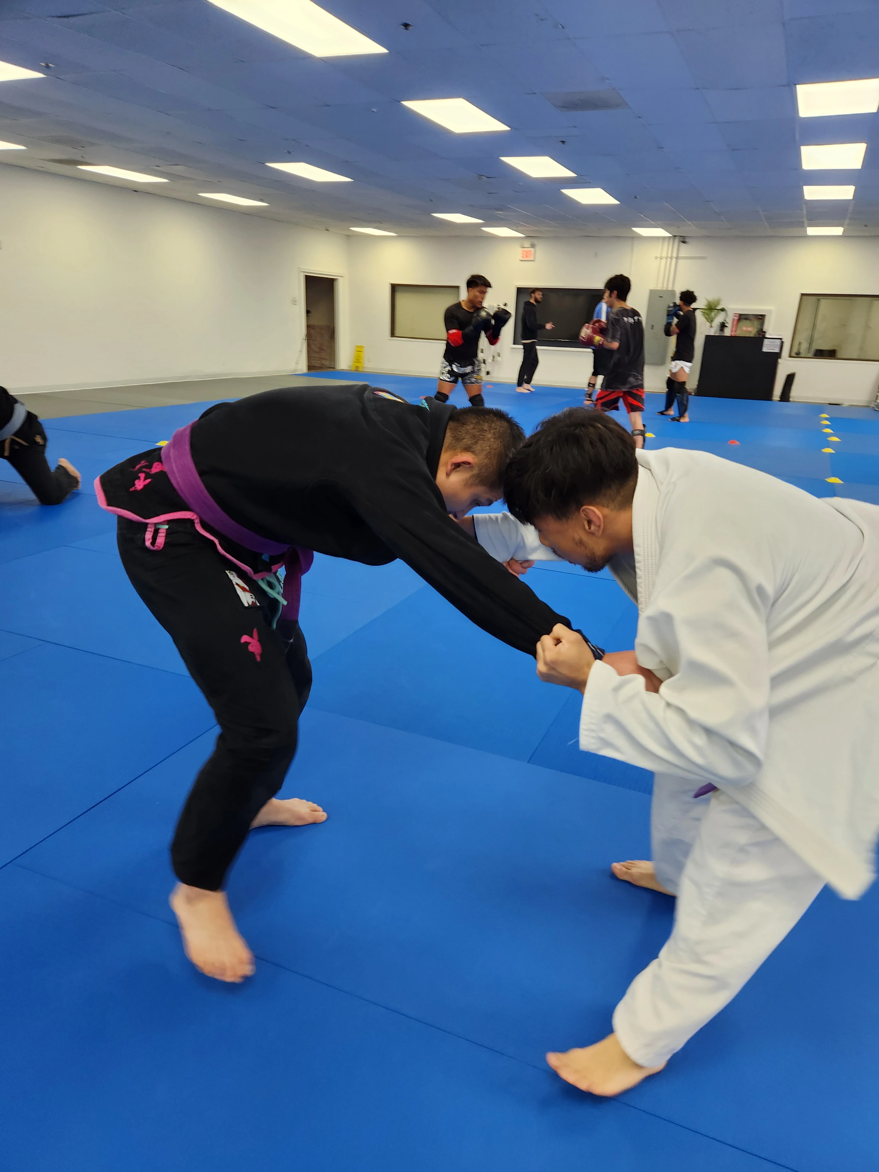 GI jiu-jitsu round at Kuleana Academy
